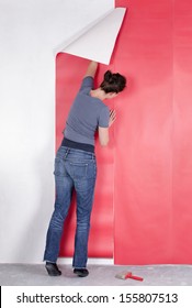 Woman Hanging Wallpaper