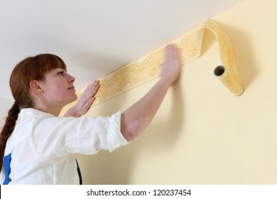 Woman Hanging Wallpaper Motif
