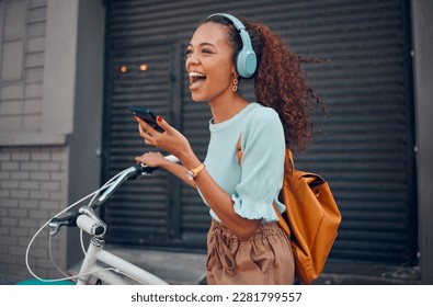 Woman, happy and bicycle with music on phone while on ride in city. Black woman, excited and smile with smartphone for communication, call or streaming on app with bike to reduce carbon footprint - Powered by Shutterstock