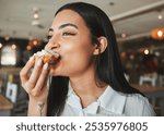 Woman, happy and eating pastry at cafe with thinking, breakfast and start morning with inspiration. Person, hungry and smile for snack with dessert, memory and reflection with cake at restaurant