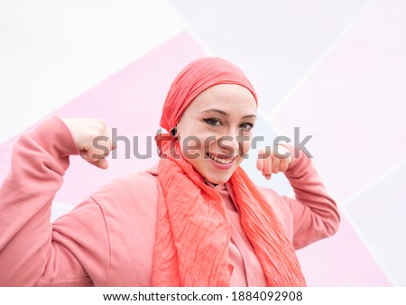 woman happy to fight cancer pink scarf