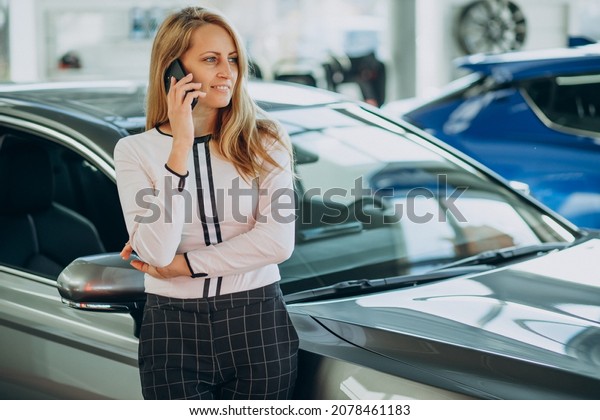 Woman happy just bought her
new car