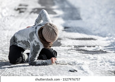 Woman Has An Accident Cause Of Black Ice On The Road, Downfall And Injury, Copyspace