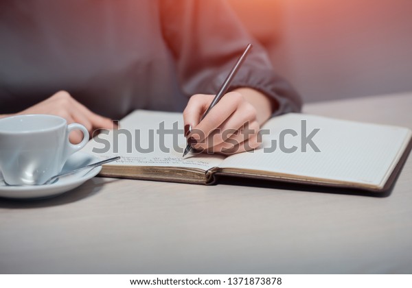 Woman Has Cup Tea Making Notes Stock Photo Edit Now