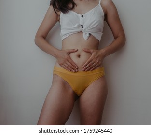 A Woman Has A Lower Abdominal Pain