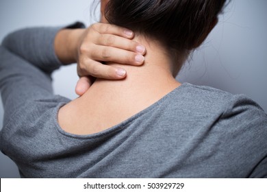 Woman Has Neck Pain