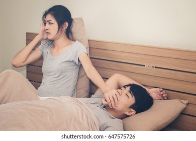 A Woman Has A Nuisance To The Man He Loves Sleeping Loud Snoring.Concept Of Life Together