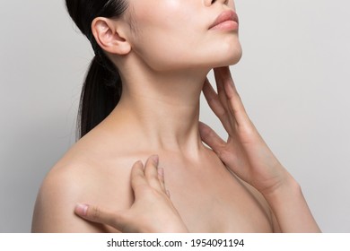 A Woman Has Skincare On Her Neck.