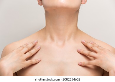 A Woman Has Skincare On Her Neck.