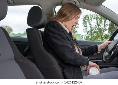 A Woman Has Spilled Her Coffee During The Car Ride