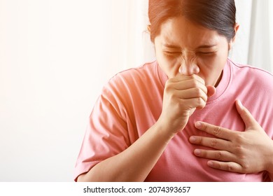 A Woman Has Symptoms Of Coughing, Sputum, Flu Caused By COVID-19.