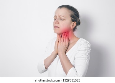 The Woman Has A Thyroid Disorder. Sore Throat. Inflamed Glands.