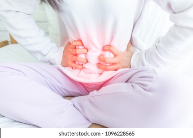 Woman Have Bladder Pain And Stomach Ache Sitting On Bed In Bedroom After Wake Up Feeling So Sick And Painful,Healthcare Concept