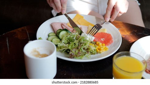 Woman Have A Breakfast In Hotel, Eating Feta Cheese