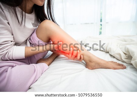 woman have a Calf leg pain,Healthcare concept