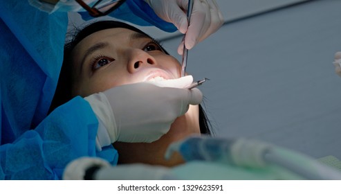 Woman Have Dental Check Up In The Clinic