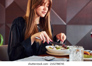 Woman Have Luxury Dinner. Indoors Of New Modern Luxury Restaurant.