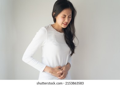 Woman Have A Stomach Pain From Menstruation Isolated On Background