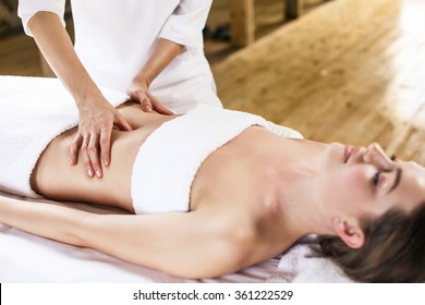 Woman Having Abdomen Massage.