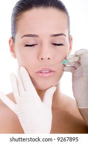 woman having beauty treatment, silicone injection in lips