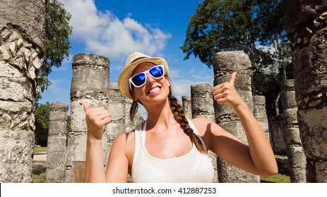 Woman Having Fun At Chichen Itza Ruins, Mayan Riviera, Mexico. Female Tourist On Vacation Travel.