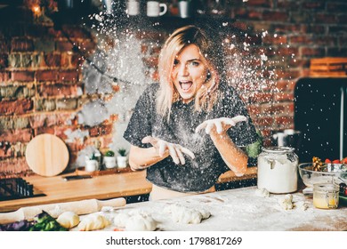 Woman Having Fun With Flour In The Kitchen.