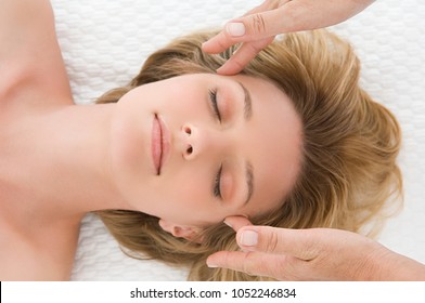 A Woman Having A Head Massage