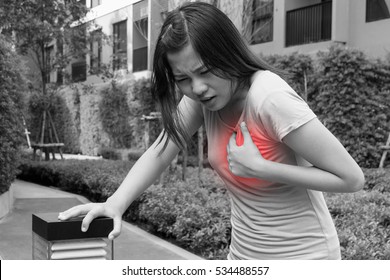 Woman Having Heart Attack, Angina Pectoris, Myocardial Infarction - Black And White Concept