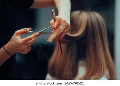 
Woman Having her Ends Trimmed in a Hair Salon 

Client cutting her straight blonde hair shorter at the salon 
 - Powered by Shutterstock