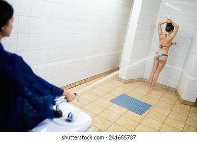 Woman Having High Pressure Massage With Sharko Shower 