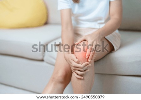 woman having knee ache and muscle pain due to Runners Knee or Patellofemoral Pain Syndrome, osteoarthritis, arthritis, rheumatism and Patellar Tendinitis. medical concept