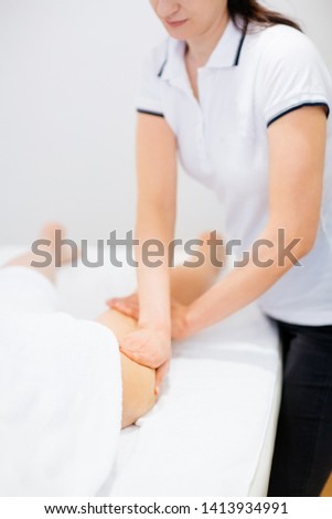 Similar – Female receiving treatment by professional osteopathy therapist