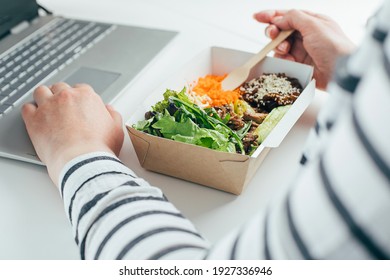 Woman Having Lunch From Recycled Bowl And Using Laptop. Concept Of Food Delivery, Quarantine, Take Out Food