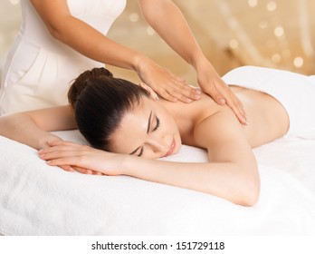 Woman Having Massage Of Body In The Spa Salon. Beauty Treatment Concept.