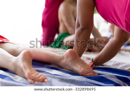 Woman having a massage  on the beach in Thailand