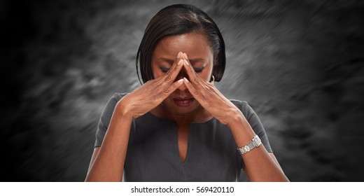 Woman having a migraine headache.
