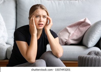 Woman having panic attack at home