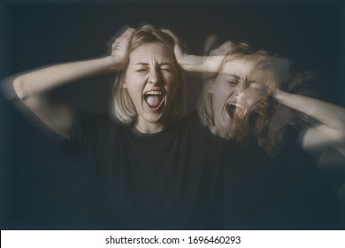 Woman having panic attack on dark background