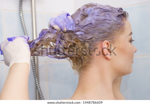 Woman Having Purple Shampoo Foam On Stock Photo Edit Now 1448786609