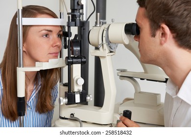 Woman Having Sight Test At Opticians