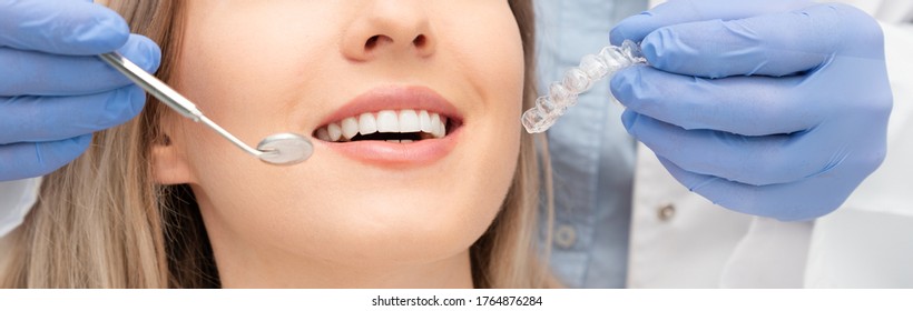 Woman Having Teeth Examined At Dentists. Teeth Whitening, Dental Care Concept