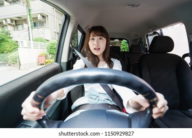 Woman having a traffic accident