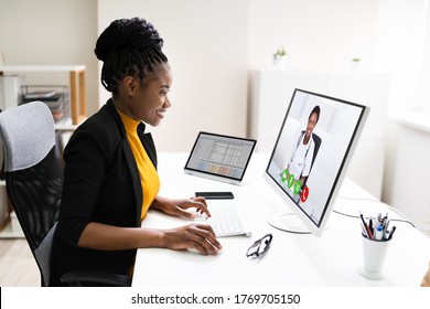 Woman Having Video Conference Web Call With Doctor