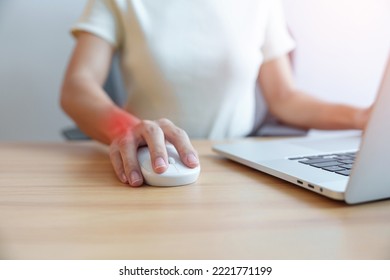 Woman having wrist pain when using mouse during working long time on workplace. De Quervain s tenosynovitis, ergonomic, Carpal Tunnel Syndrome or Office syndrome concept - Shutterstock ID 2221771199