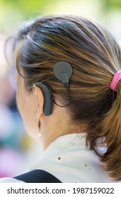 Woman Head With Cochleral Implant Hearing Aid