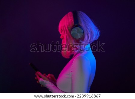 Similar – Young woman using technology