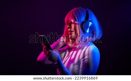 Young woman using technology