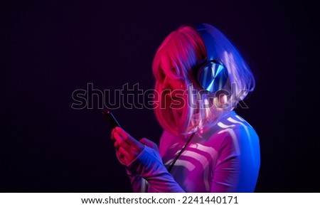 Similar – Young woman using technology