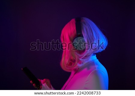 Similar – Young woman using technology