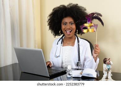  woman in health professional uniform holds a carnival mask, Brazilian party
 - Shutterstock ID 2252383779